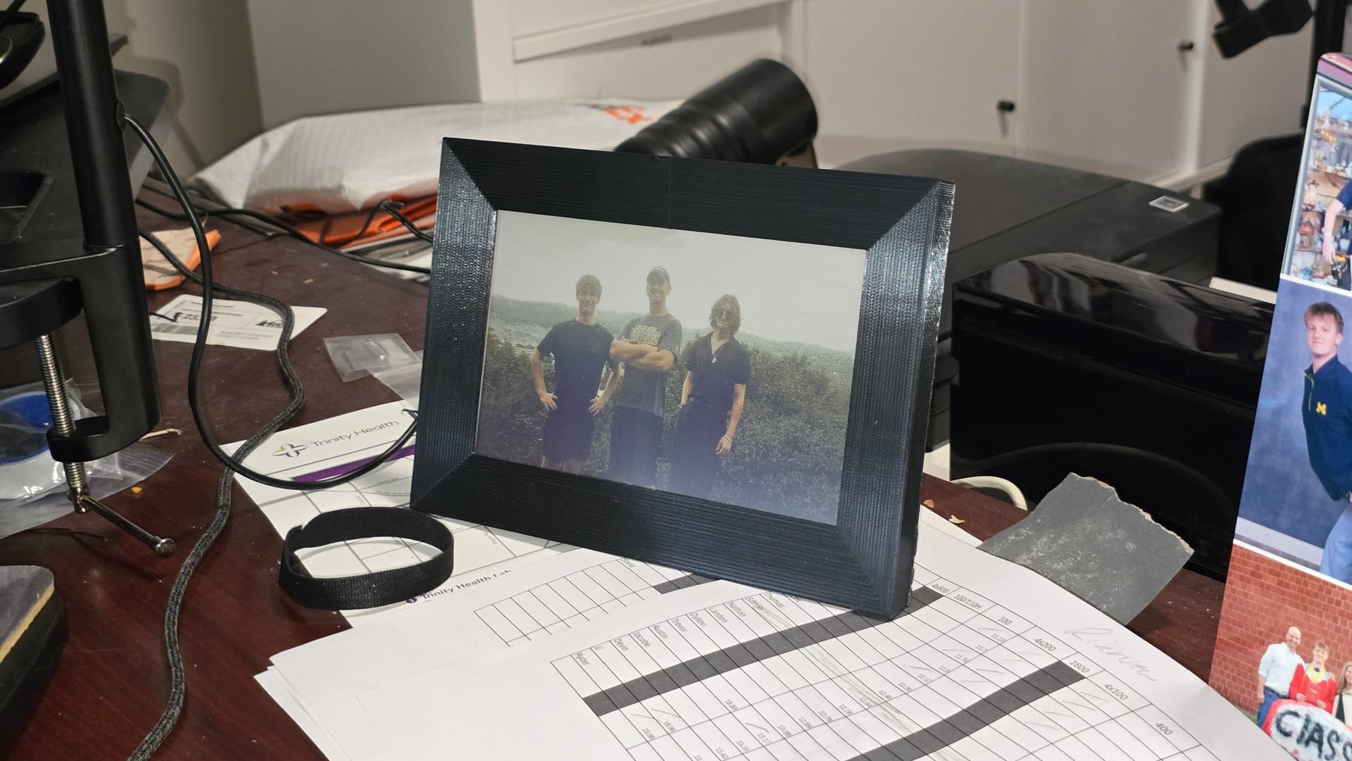 The finished frame on my dad's desk, displaying a family photo